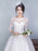 A-Line Wedding Dresses Jewel Neck Tea Length Tulle Sheer Lace 3\4 Length Sleeve Casual See-Through Backless with Beading Appliques 2020 - 