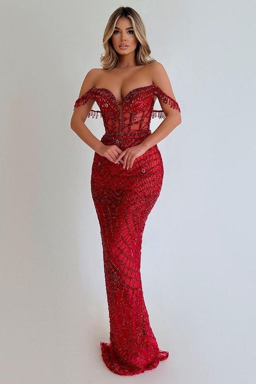 Glamorous Red Sequin Prom Gown with Tassel Detail and Strapless Design