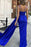 Regal Blue Mermaid Prom Gown with Flirty V-Neck and Elegant Ruffle Detail