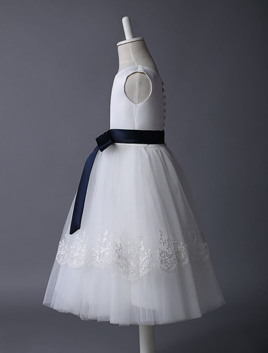 Ivory Tulle Flower Girl Dress With Lace Applique And Navy Blue Sash