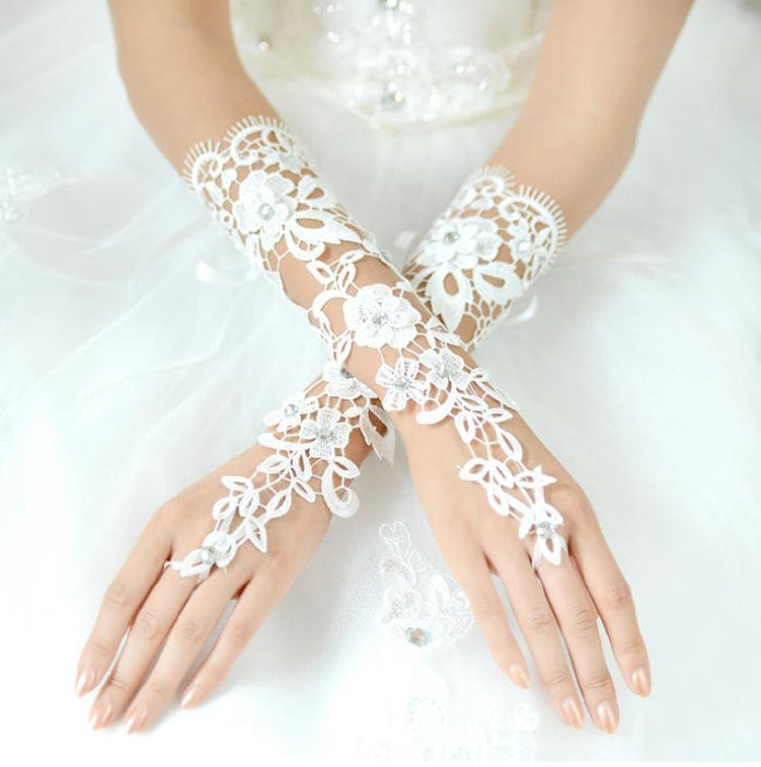 https://www.bridelily.com/cdn/shop/products/lace-crystal-beaded-fingerless-wedding-gloves-bridelily-386_695x700.jpg?v=1629973676