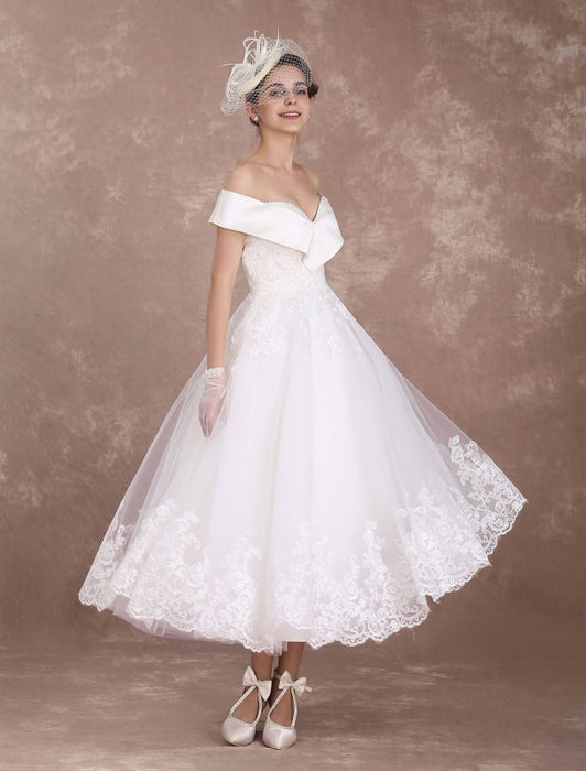 https://www.bridelily.com/cdn/shop/products/vintage-wedding-dresses-off-the-shoulder-short-bridal-dress-1950s-lace-applique-beaded-tea-length-reception-exclusive-661_532x700.jpg?v=1630103546