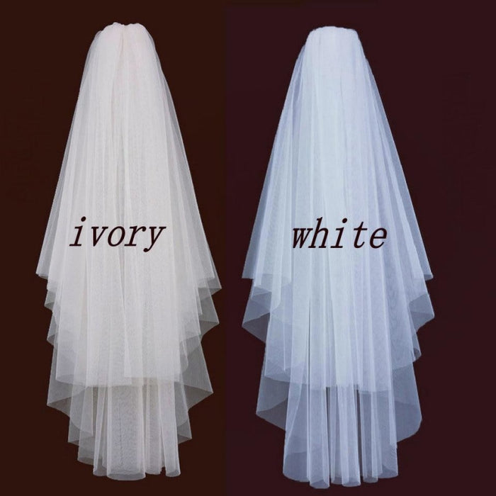 https://www.bridelily.com/cdn/shop/products/white-veil-short-tulle-with-comb-wedding-veils-bridelily-651_700x700.jpg?v=1629971591